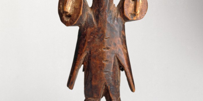Unknown Lega artist. Three-Headed Figure (Sakimatwemtwe), 19th century, South Kivu or Maniema Province, Democratic Republic of the Congo. Wood, fiber, kaolin, 5 1/2 × 2 × 1 1/8 in. (14 × 5.1 × 2.9 cm). Brooklyn Museum; Museum Expedition 1922, Robert B. Woodward Memorial Fund, 22.486. (Photo: Brooklyn Museum)
